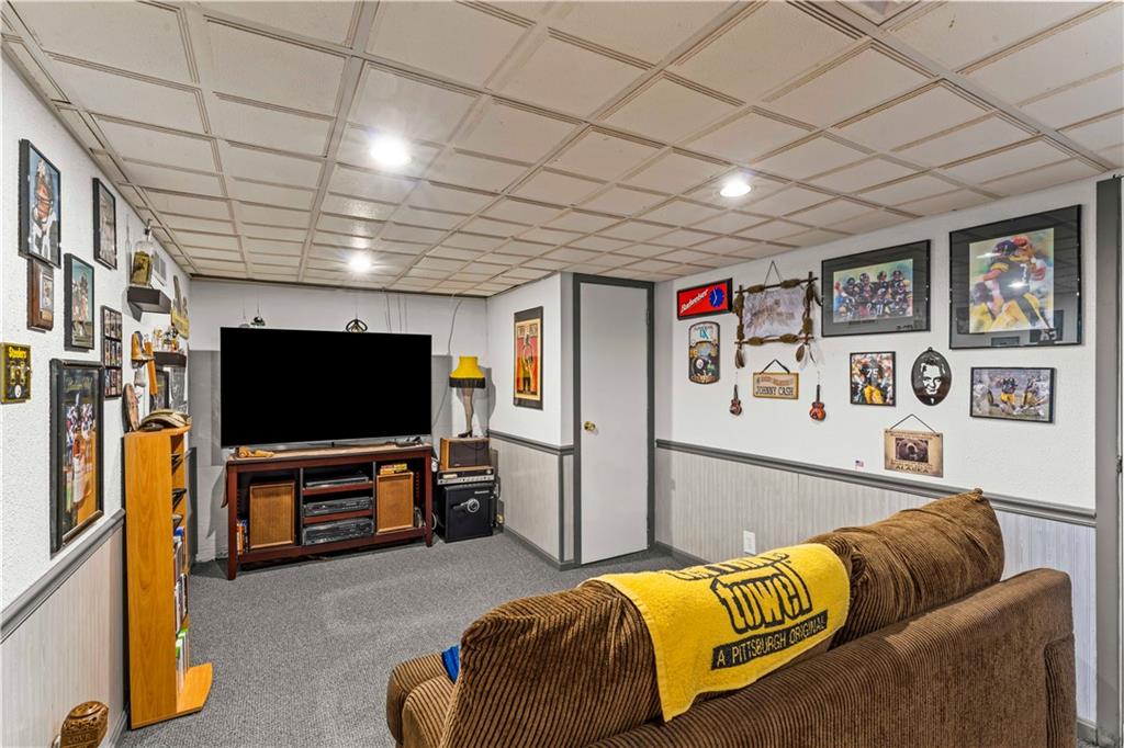 412 Center Church Road Canonsburg, PA 15317 - Photo 14 of 24 a living room with furniture and a flat screen tv
