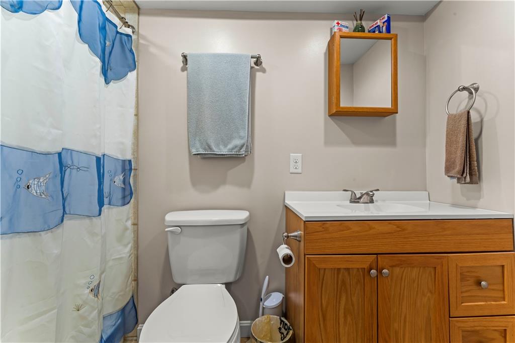 412 Center Church Road Canonsburg, PA 15317 - Photo 15 of 24 a bathroom with a toilet sink and mirror