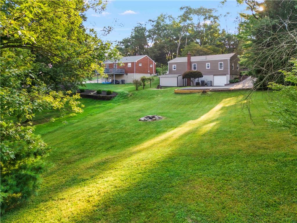 412 Center Church Road Canonsburg, PA 15317 - Photo 19 of 24 a aerial view of a house with a big yard and large trees