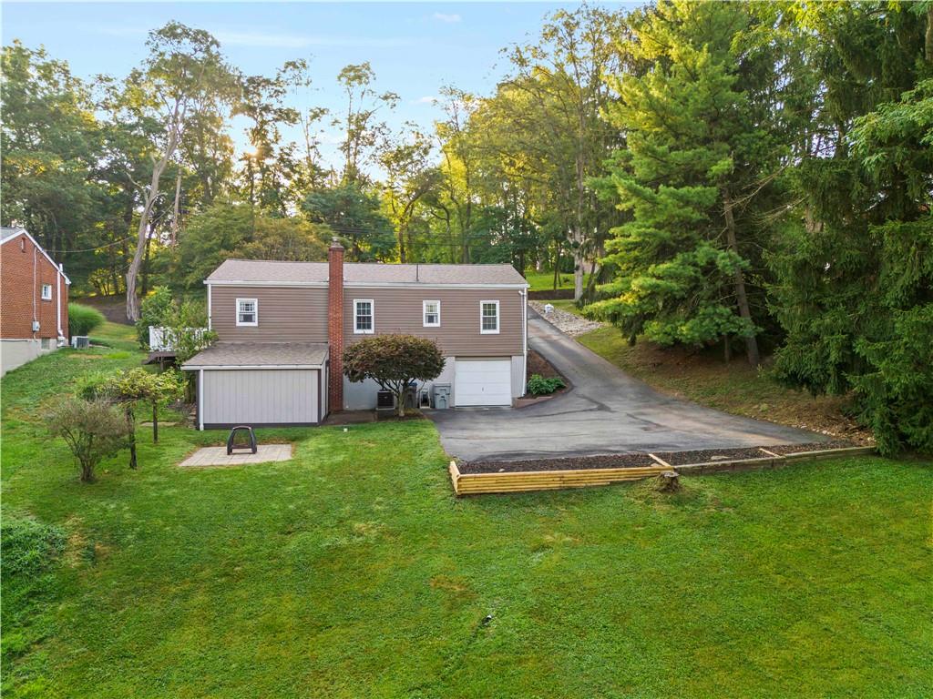 412 Center Church Road Canonsburg, PA 15317 - Photo 20 of 24 a aerial view of a house with a big yard