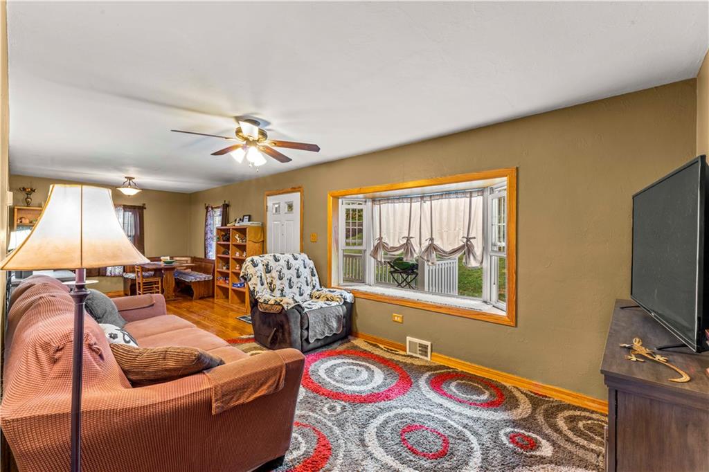 412 Center Church Road Canonsburg, PA 15317 - Photo 3 of 24 a living room with furniture and a flat screen tv