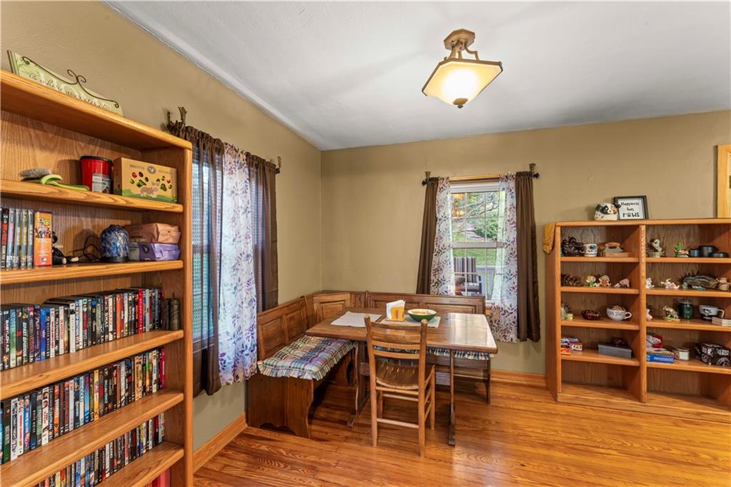 412 Center Church Road Canonsburg, PA 15317 - Photo 4 of 24 a bedroom with furniture and a book shelf