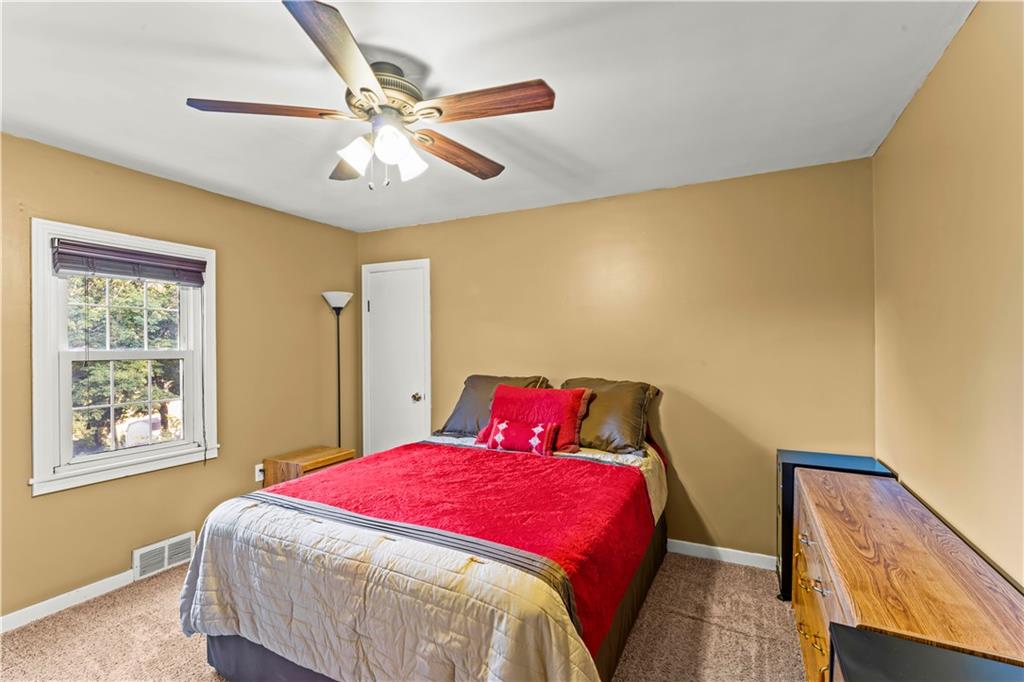 412 Center Church Road Canonsburg, PA 15317 - Photo 8 of 24 a bedroom with a bed and wooden floor