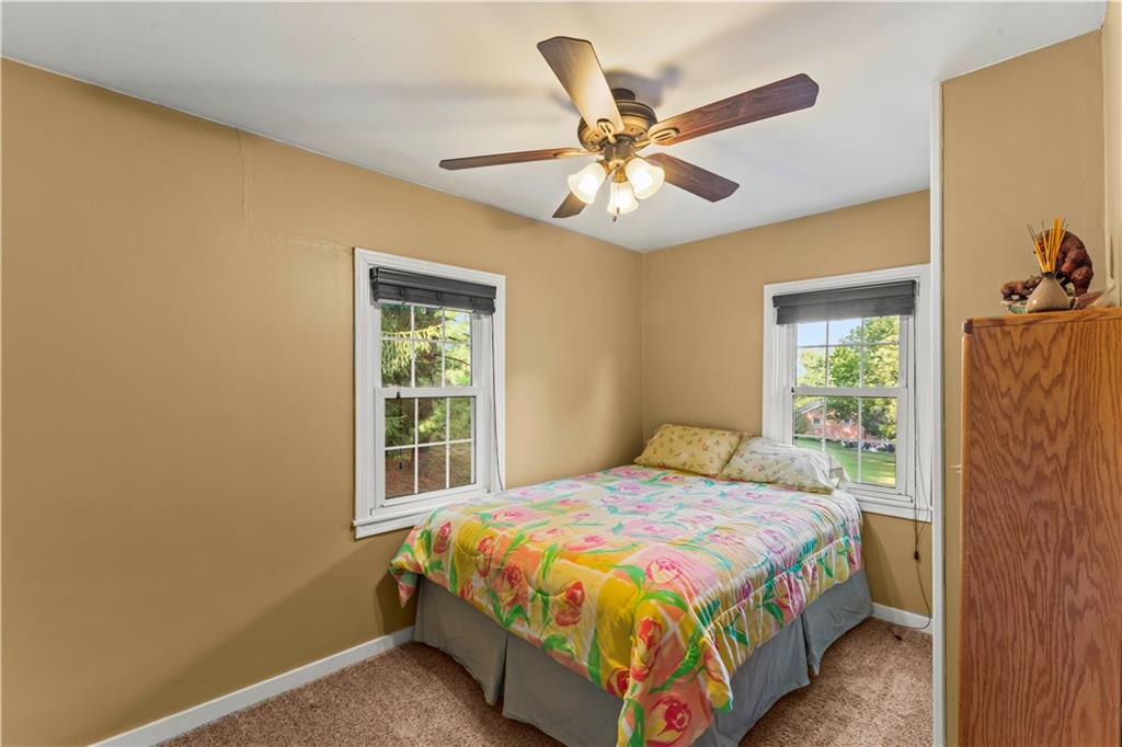 412 Center Church Road Canonsburg, PA 15317 - Photo 10 of 24 a bedroom with a bed and a window