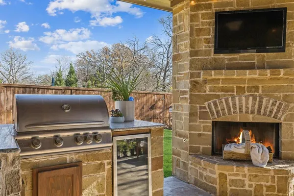 a kitchen with a stove and a microwave