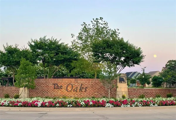 an aerial view of a house with a swimming pool