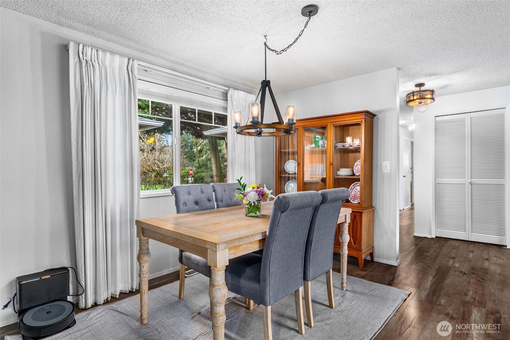 3102 60th Loop Southeast Olympia, WA 98501 - Photo 11 of 40 a dining room with furniture window entryway and wooden floor