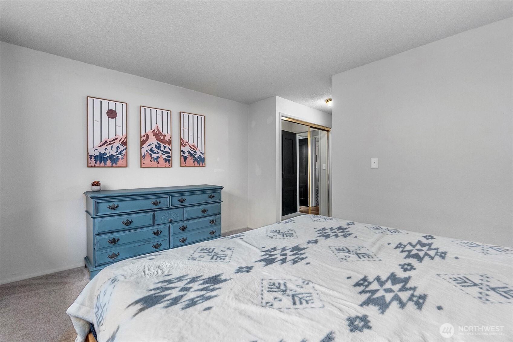 3102 60th Loop Southeast Olympia, WA 98501 - Photo 22 of 40 a bedroom with a bed and a dresser