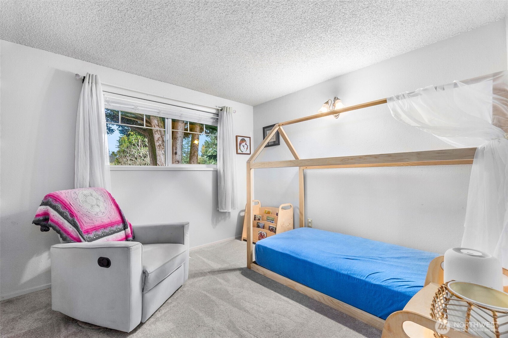 3102 60th Loop Southeast Olympia, WA 98501 - Photo 23 of 40 a bedroom with furniture and a window