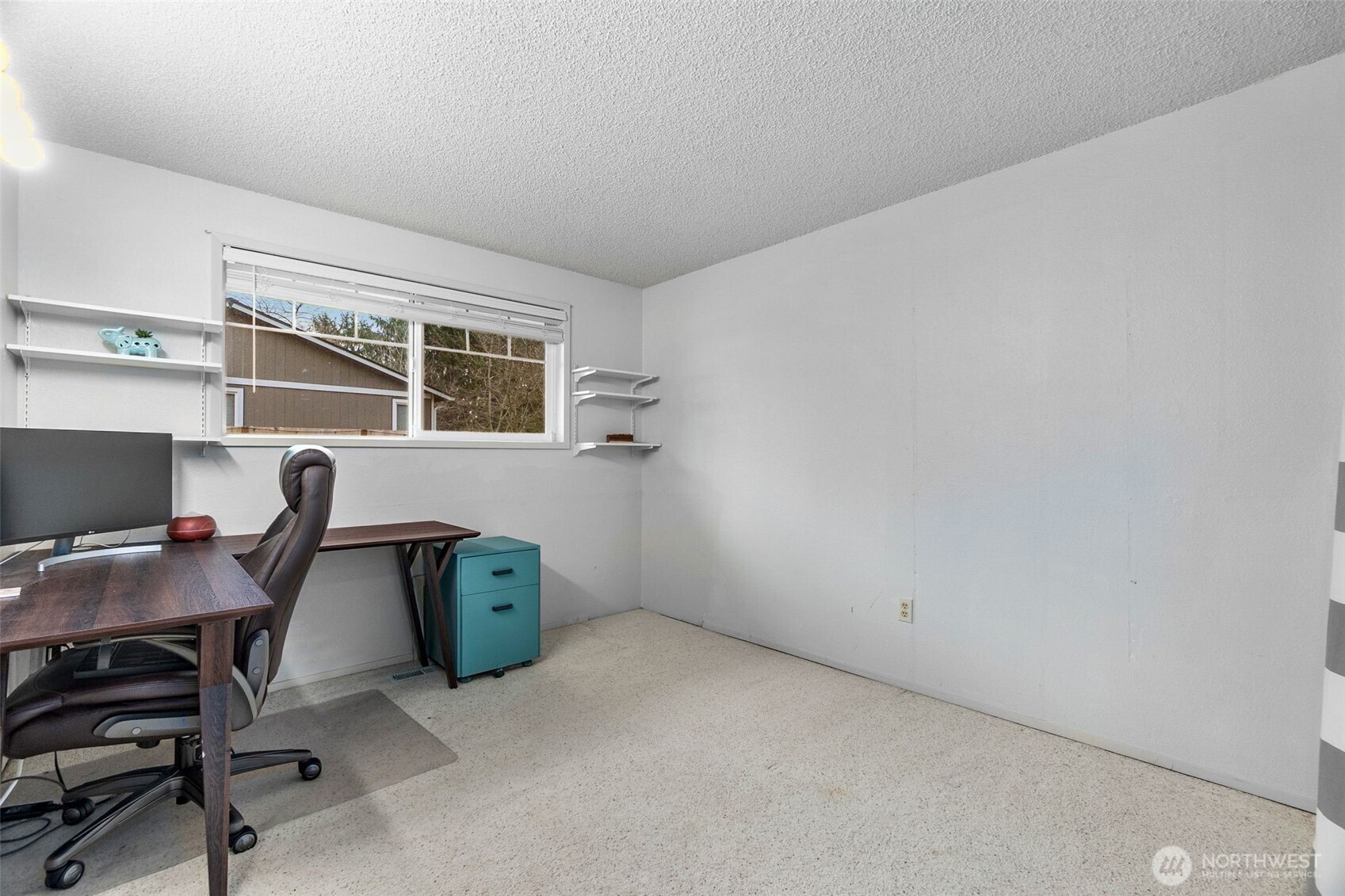 3102 60th Loop Southeast Olympia, WA 98501 - Photo 27 of 40 a workspace with furniture and window