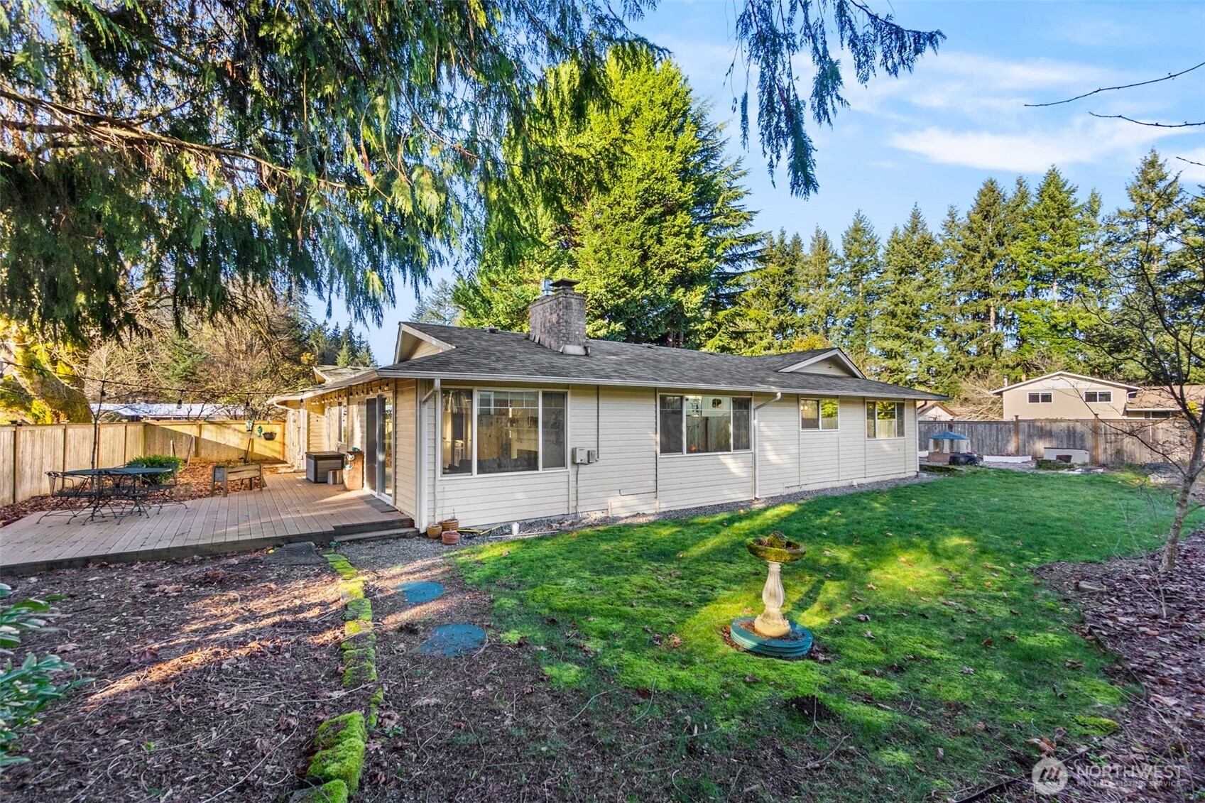 3102 60th Loop Southeast Olympia, WA 98501 - Photo 30 of 40 a front view of a house with garden