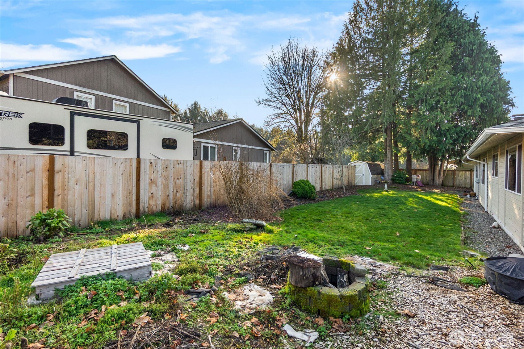 3102 60th Loop Southeast Olympia, WA 98501 - Photo 32 of 40 a front view of a house with garden