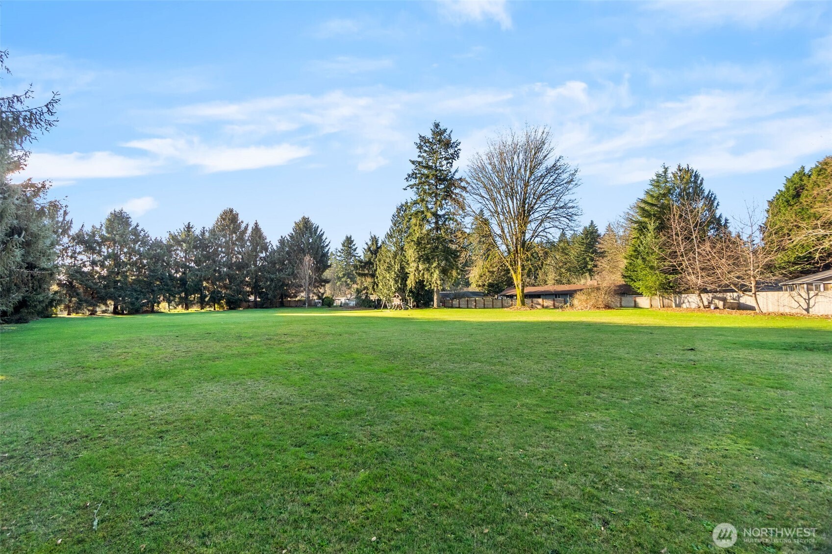 3102 60th Loop Southeast Olympia, WA 98501 - Photo 36 of 40 a view of field with trees in the background