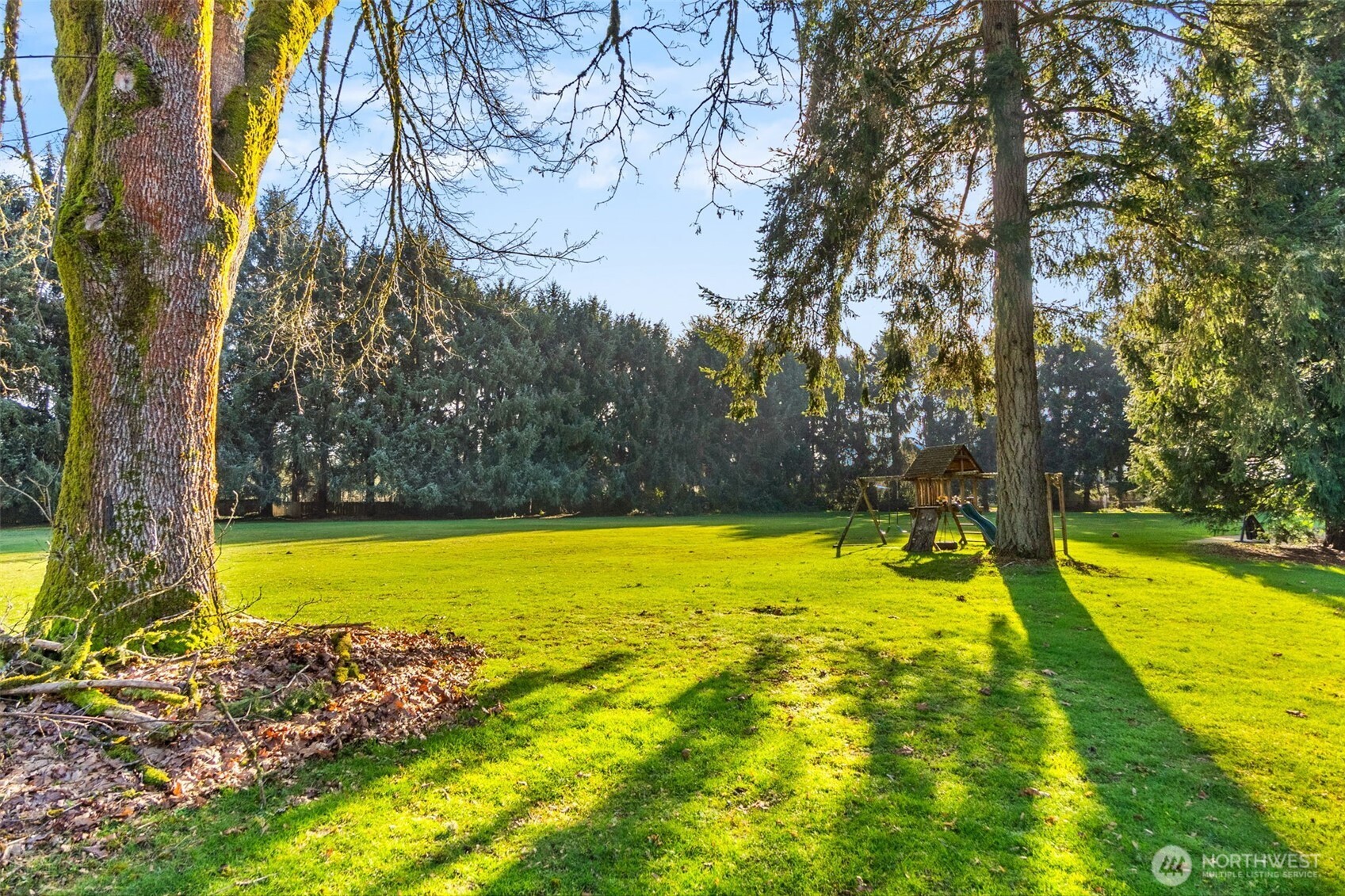 3102 60th Loop Southeast Olympia, WA 98501 - Photo 38 of 40 a view of a swimming pool with an outdoor space and seating area