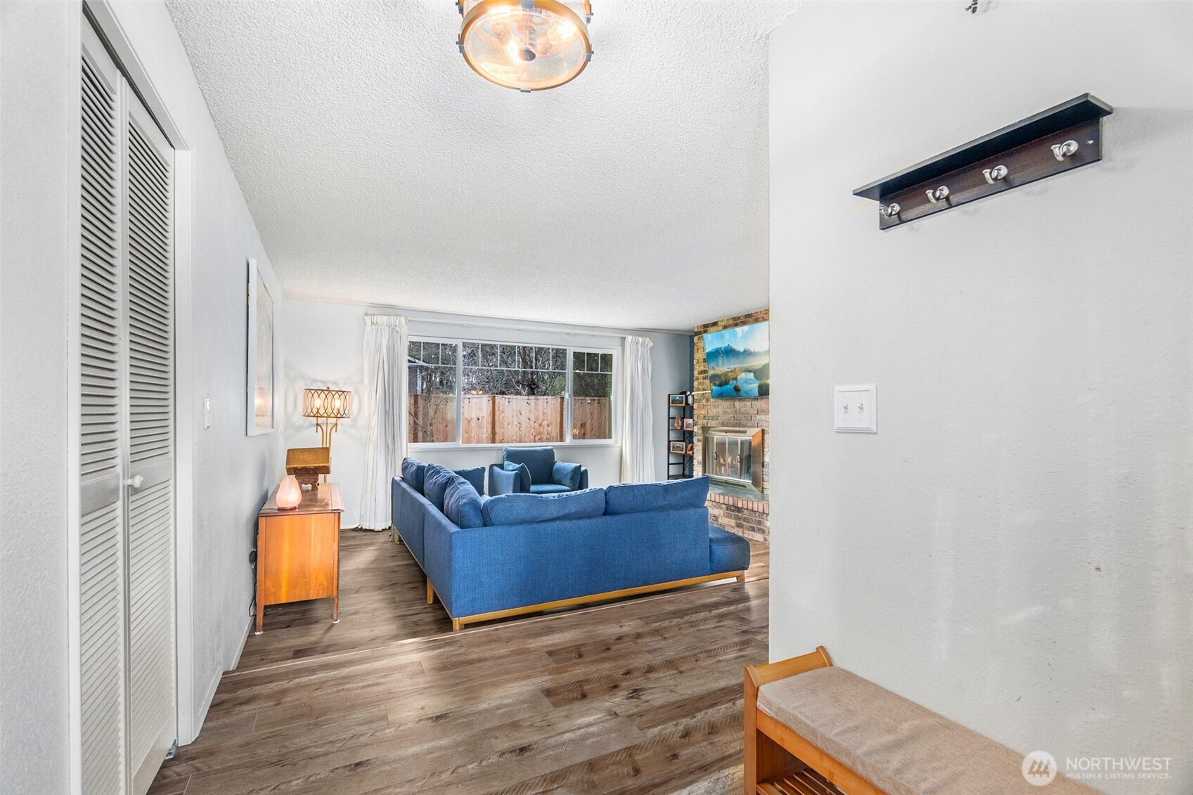 3102 60th Loop Southeast Olympia, WA 98501 - Photo 4 of 40 a living room with furniture and a window