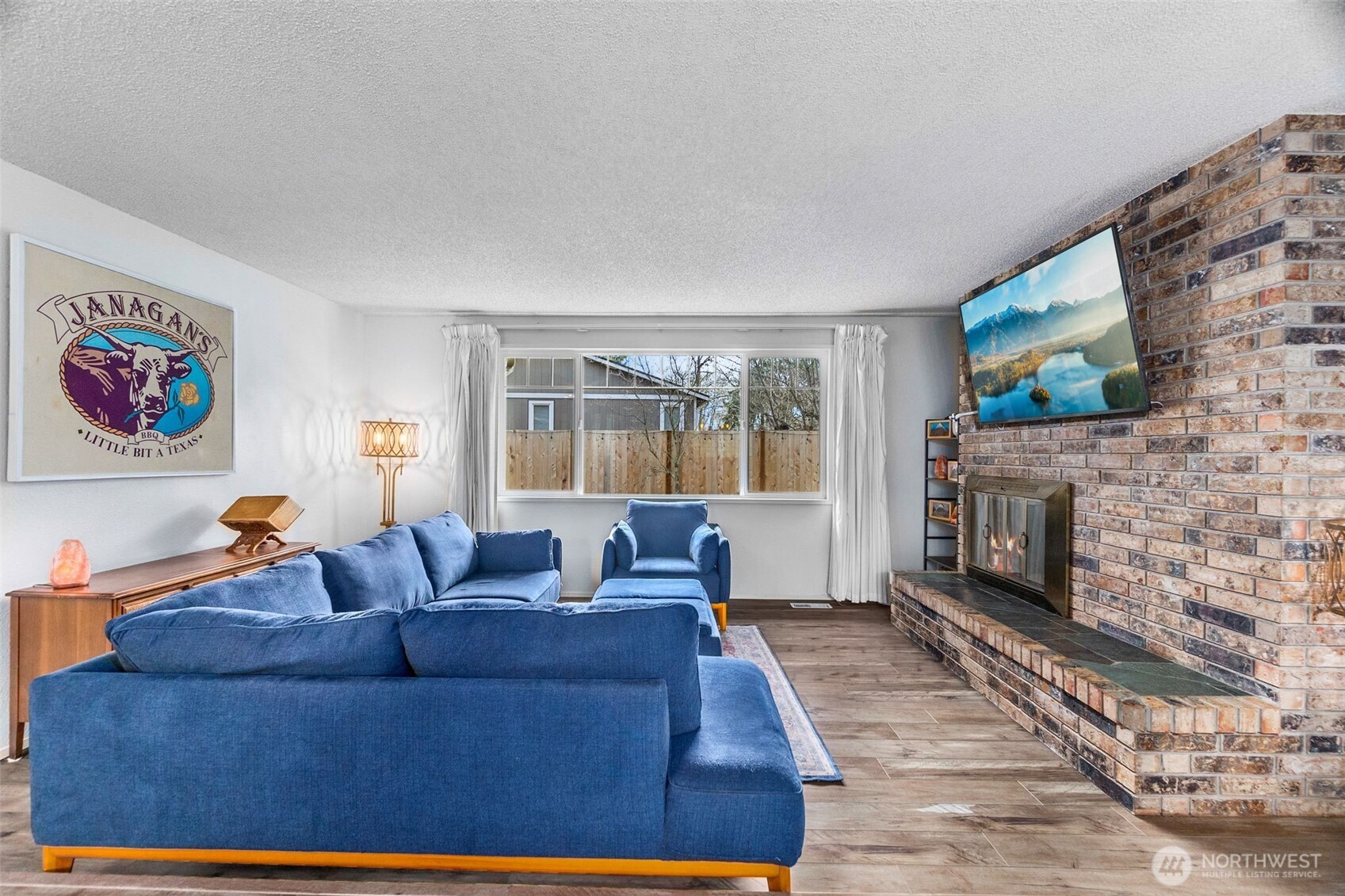 3102 60th Loop Southeast Olympia, WA 98501 - Photo 6 of 40 a living room with furniture and a fireplace