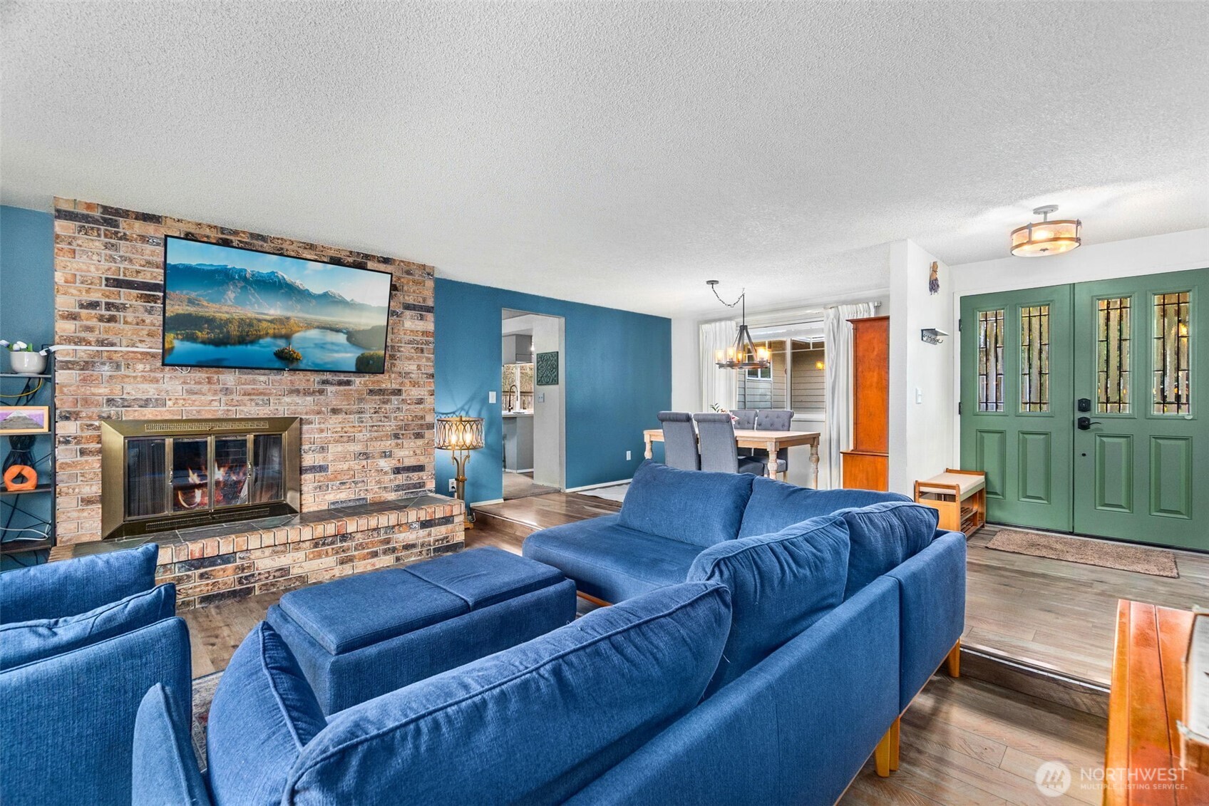 3102 60th Loop Southeast Olympia, WA 98501 - Photo 9 of 40 a living room with furniture fireplace and flat screen tv