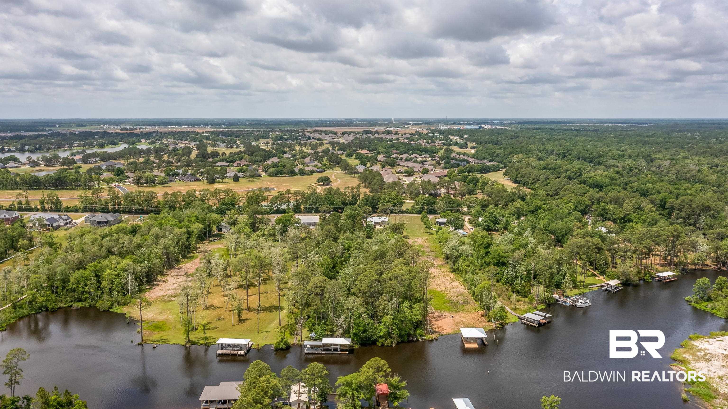 9771 Clarke Ridge Road Foley, AL 36535 - Photo 68 of 72 Birds eye view of property with a wooded view and a water view