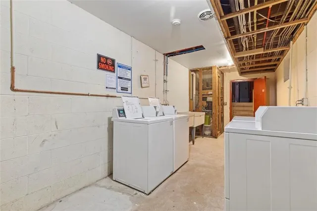 a utility room with dryer and washer