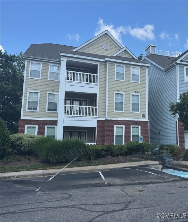 604 Bristol Village Drive, Unit 303 Midlothian, VA 23114 - Photo 2 of 18 a front view of a building
