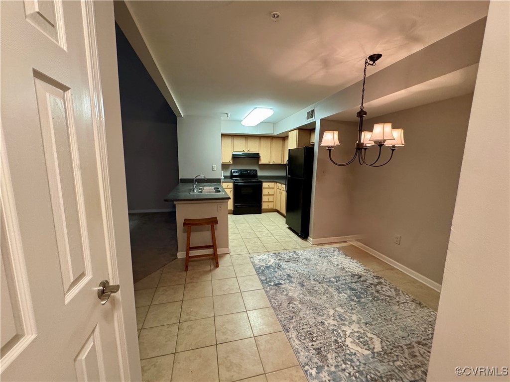 604 Bristol Village Drive, Unit 303 Midlothian, VA 23114 - Photo 10 of 18 a kitchen with a sink a counter top space and appliances