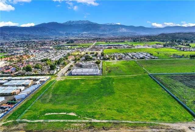 a view of a city with mountains in the background