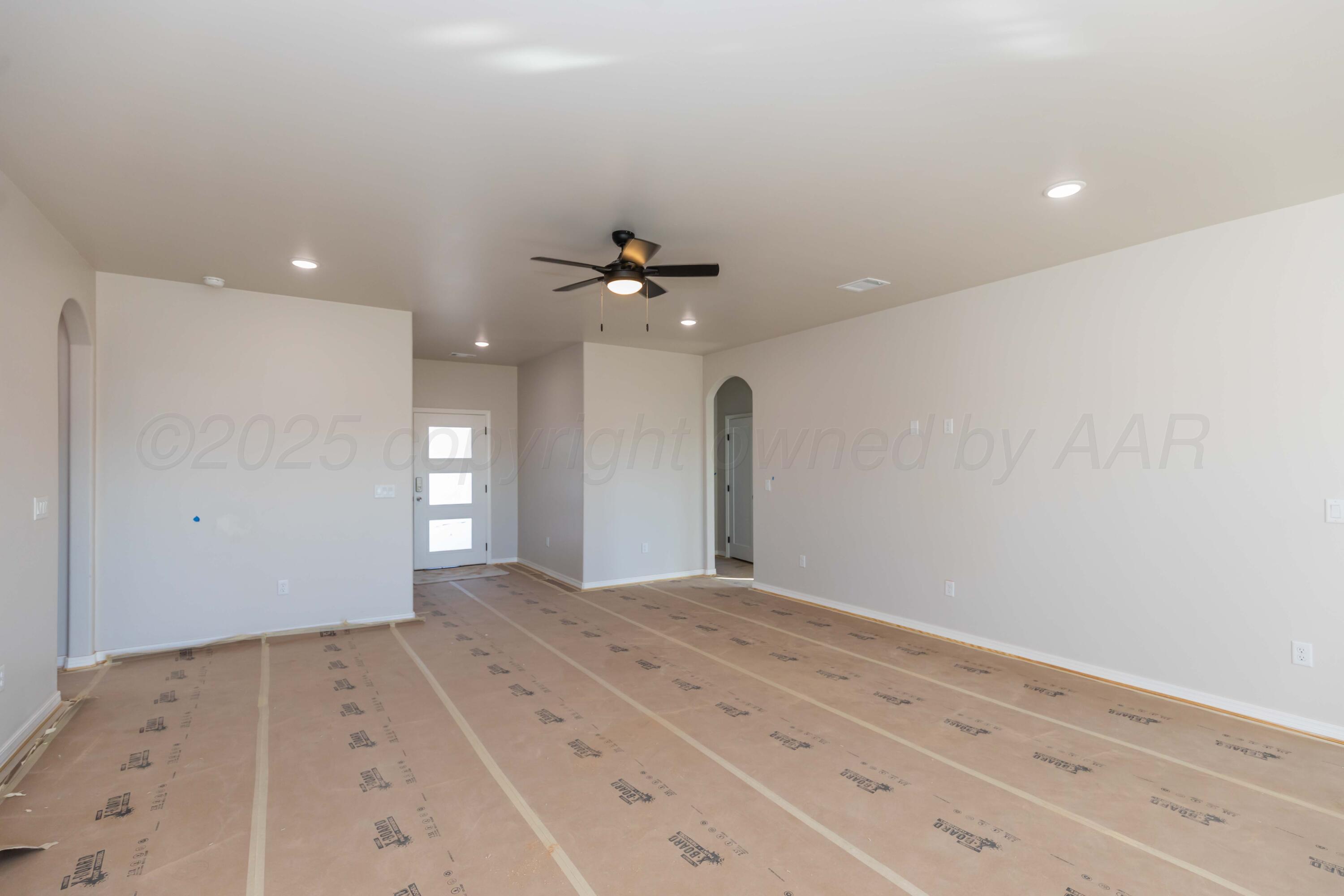 1205 Cabernet Way Amarillo, TX 79124 - Photo 2 of 13 a view of a big room with a chandelier fan