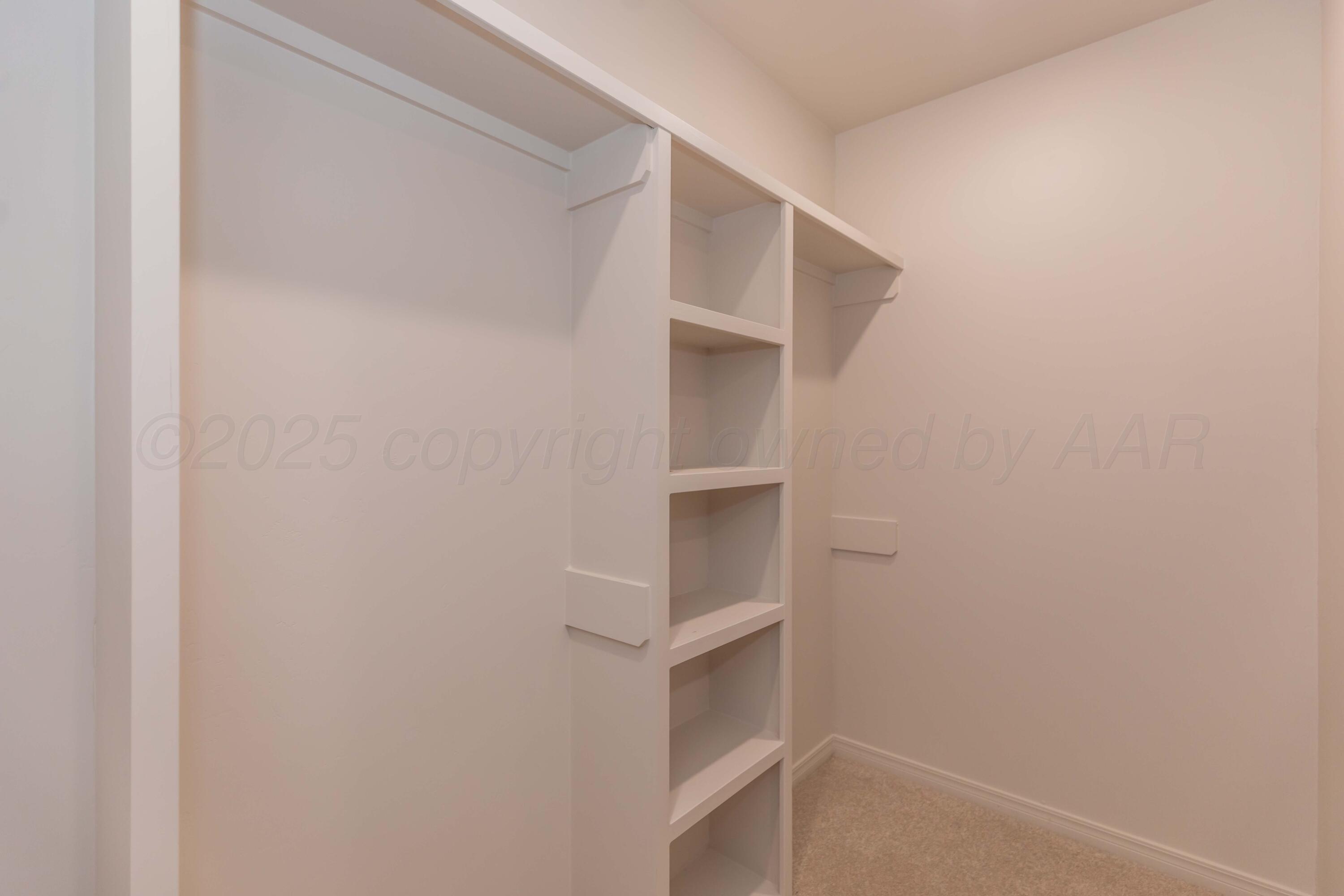 1205 Cabernet Way Amarillo, TX 79124 - Photo 9 of 12 a view of an empty walk in closet