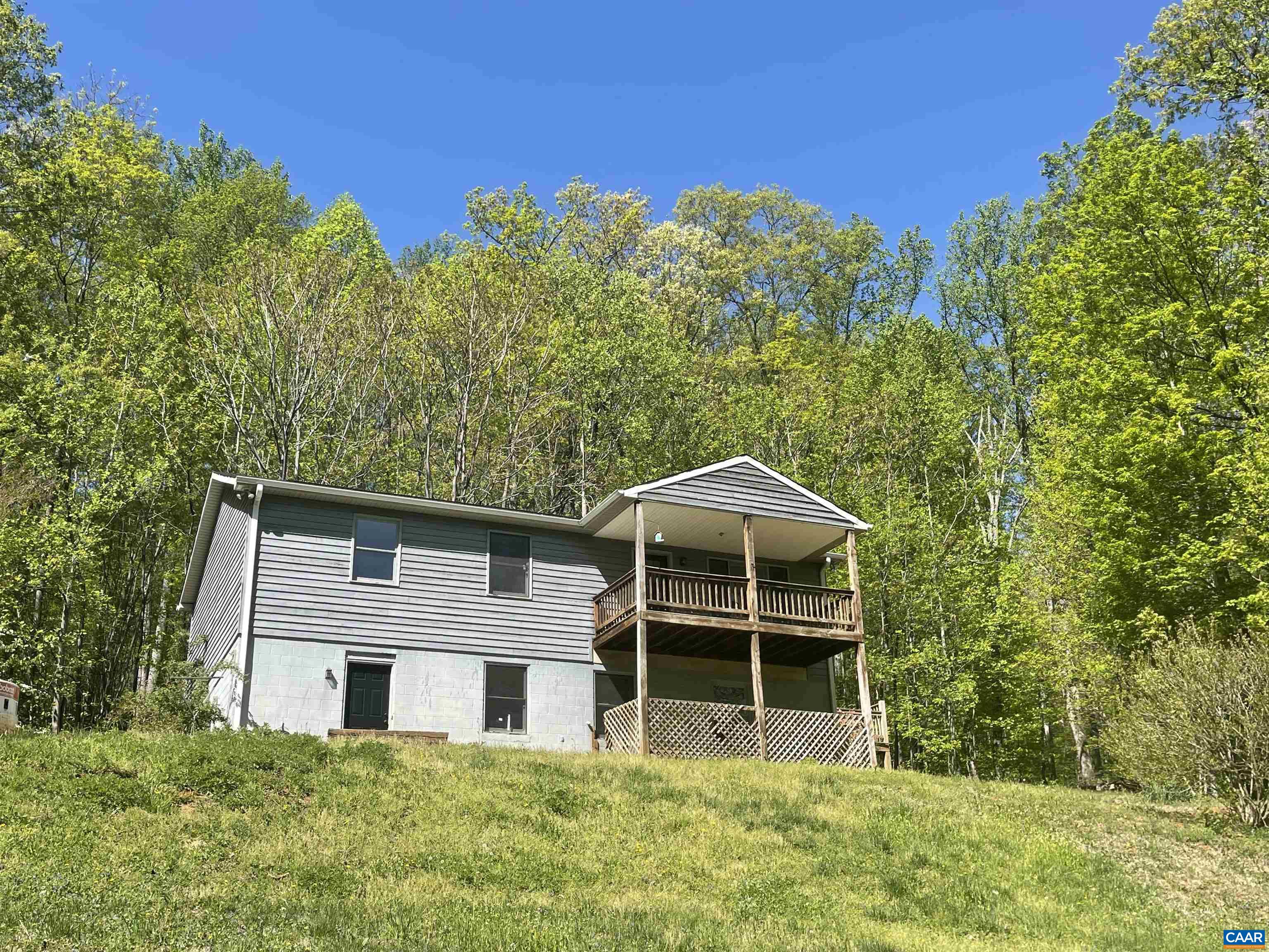 533 Simms Road Stanardsville, VA 22973 - Photo 1 of 17 front view of a house with a yard