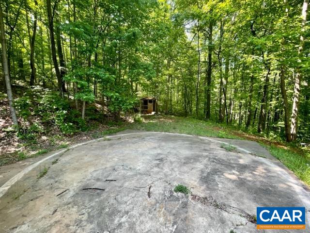 533 Simms Road Stanardsville, VA 22973 - Photo 13 of 17 a view of a street with a trees in the background
