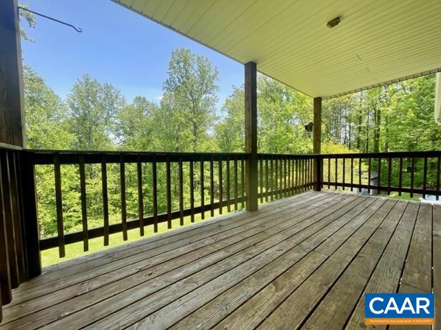 533 Simms Road Stanardsville, VA 22973 - Photo 15 of 17 a view of balcony with wooden floor