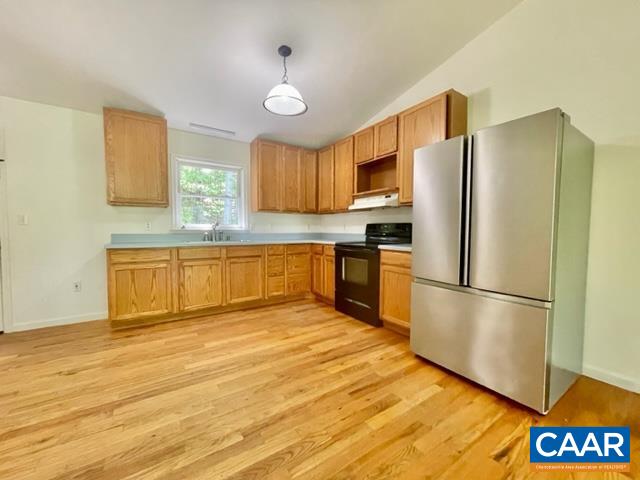 533 Simms Road Stanardsville, VA 22973 - Photo 4 of 17 a kitchen with stainless steel appliances granite countertop a refrigerator sink and cabinets