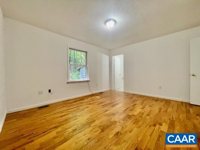 533 Simms Road Stanardsville, VA 22973 - Photo 8 of 17 a view of an empty room and window