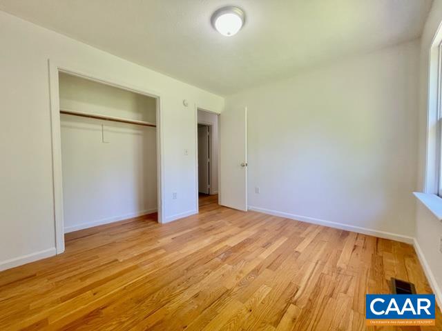 533 Simms Road Stanardsville, VA 22973 - Photo 10 of 17 a view of an empty room and wooden floor
