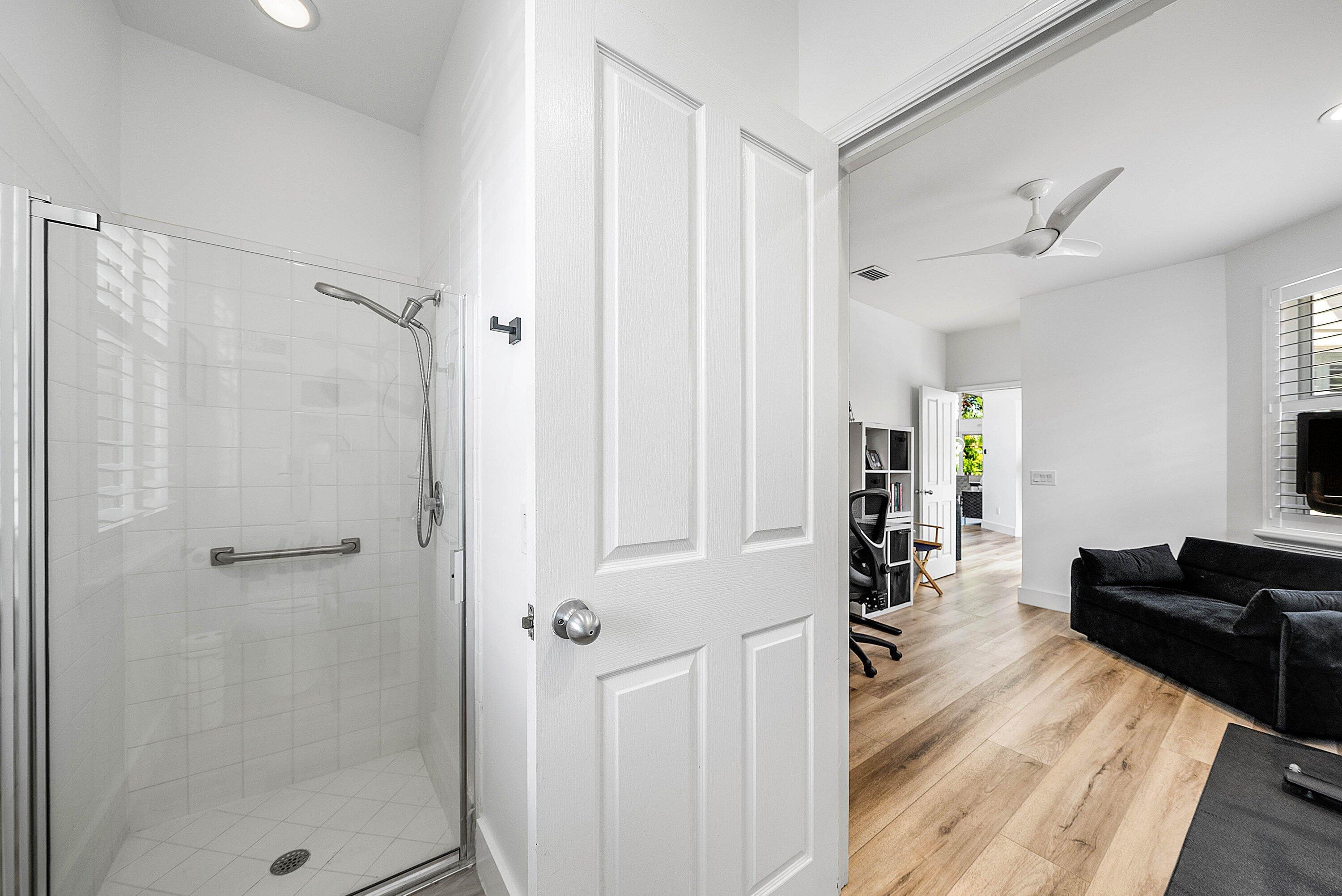5338 Northwest 26th Circle Boca Raton, FL 33496 - Photo 21 of 68 a view of a bedroom from the hallway