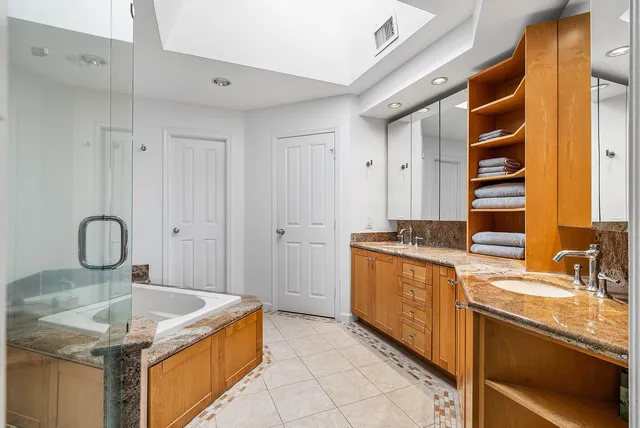 a deck view with a garden and entertaining space