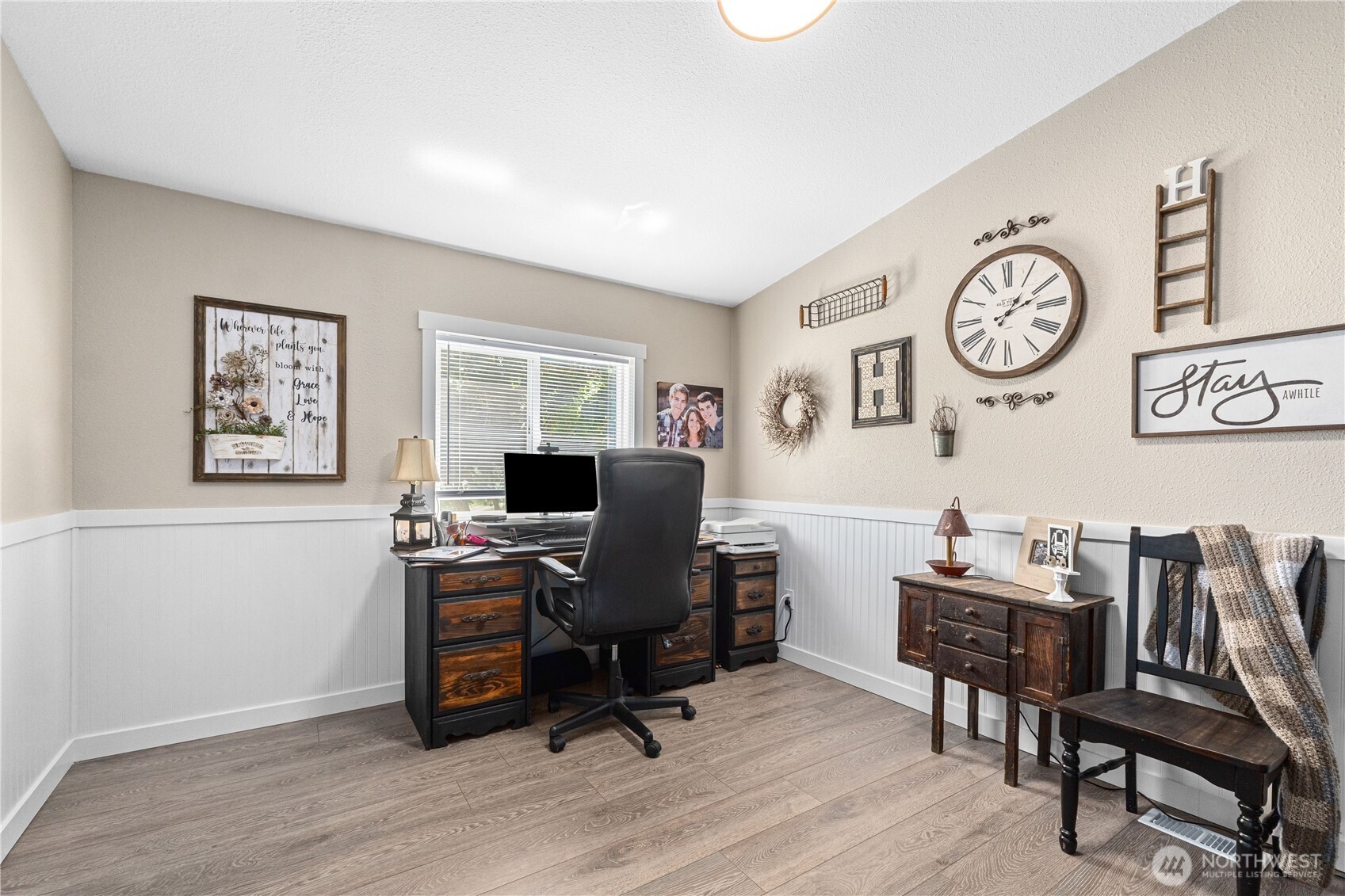 4562 Lessig Road, Unit A Hunters, WA 99137 - Photo 16 of 34 a view of a workspace with furniture and a window