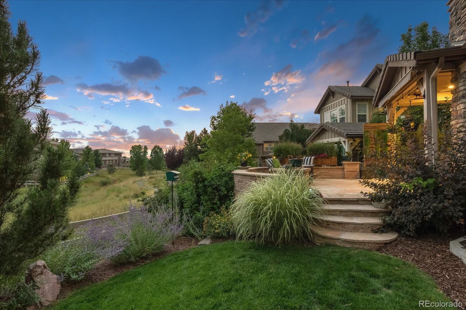 470 Maplehurst Drive Highlands Ranch, CO 80126 - Photo 36 of 40 a view of a street with a building in the background