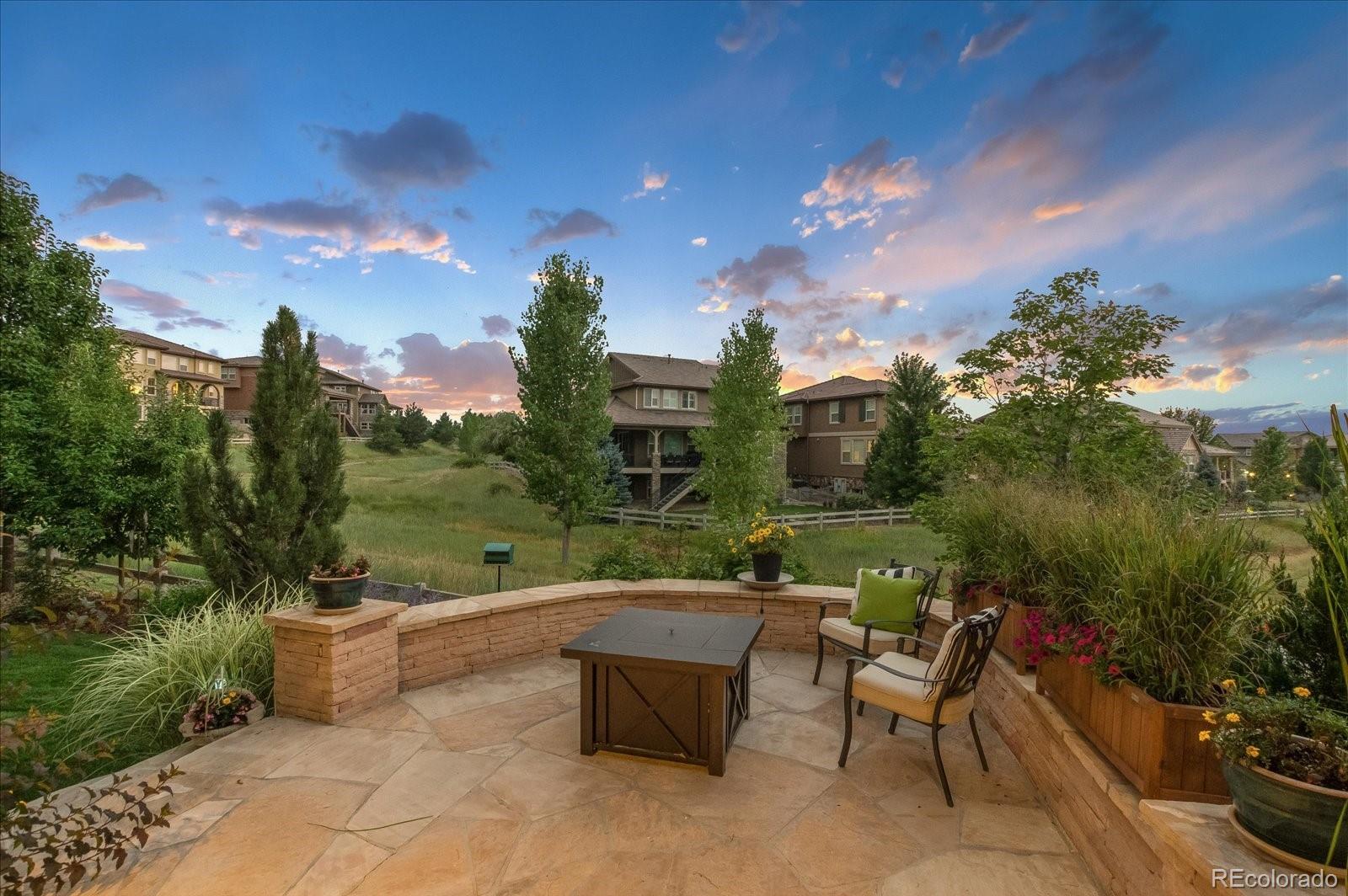 470 Maplehurst Drive Highlands Ranch, CO 80126 - Photo 37 of 40 a view of a terrace with couches and sky view