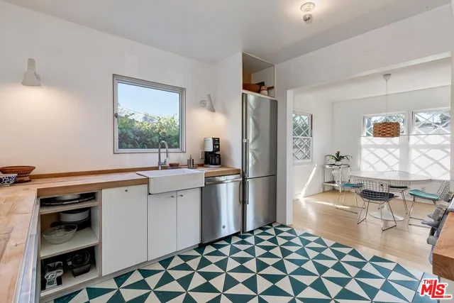 $1,299,000 | 4465 Don Miguel Drive, Los Angeles, CA 90008