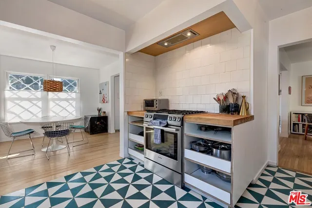 $1,299,000 | 4465 Don Miguel Drive, Los Angeles, CA 90008