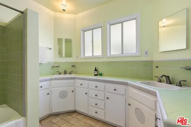 $1,299,000 | 4465 Don Miguel Drive, Los Angeles, CA 90008