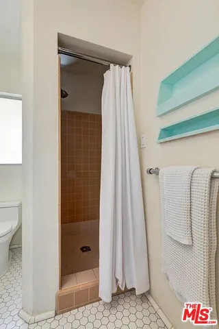 $1,299,000 | 4465 Don Miguel Drive, Los Angeles, CA 90008