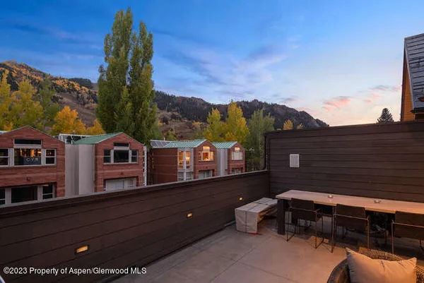 a view of a terrace with a bench