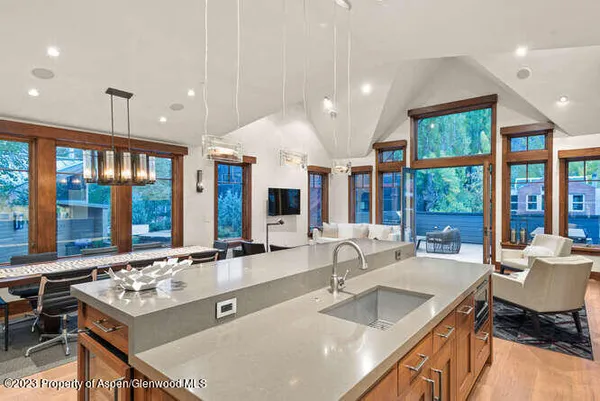a kitchen with a stove and a sink