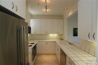 13 Marsh Road Tiburon, CA 94920 - Photo 3 of 9 a kitchen with a sink stove and refrigerator