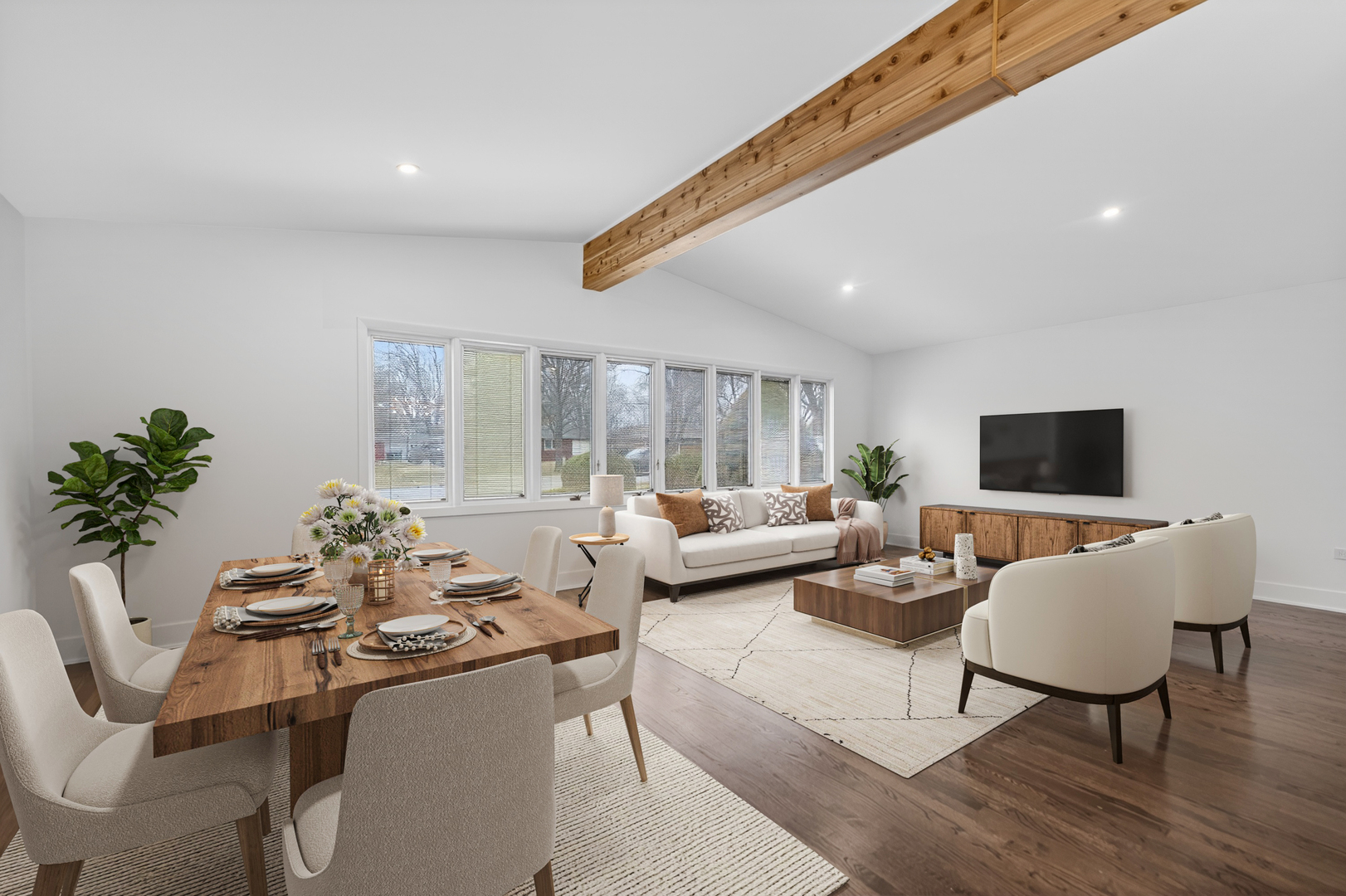 241 East Schick Road Bloomingdale, IL 60108 - Photo 6 of 30 a living room with furniture and a flat screen tv