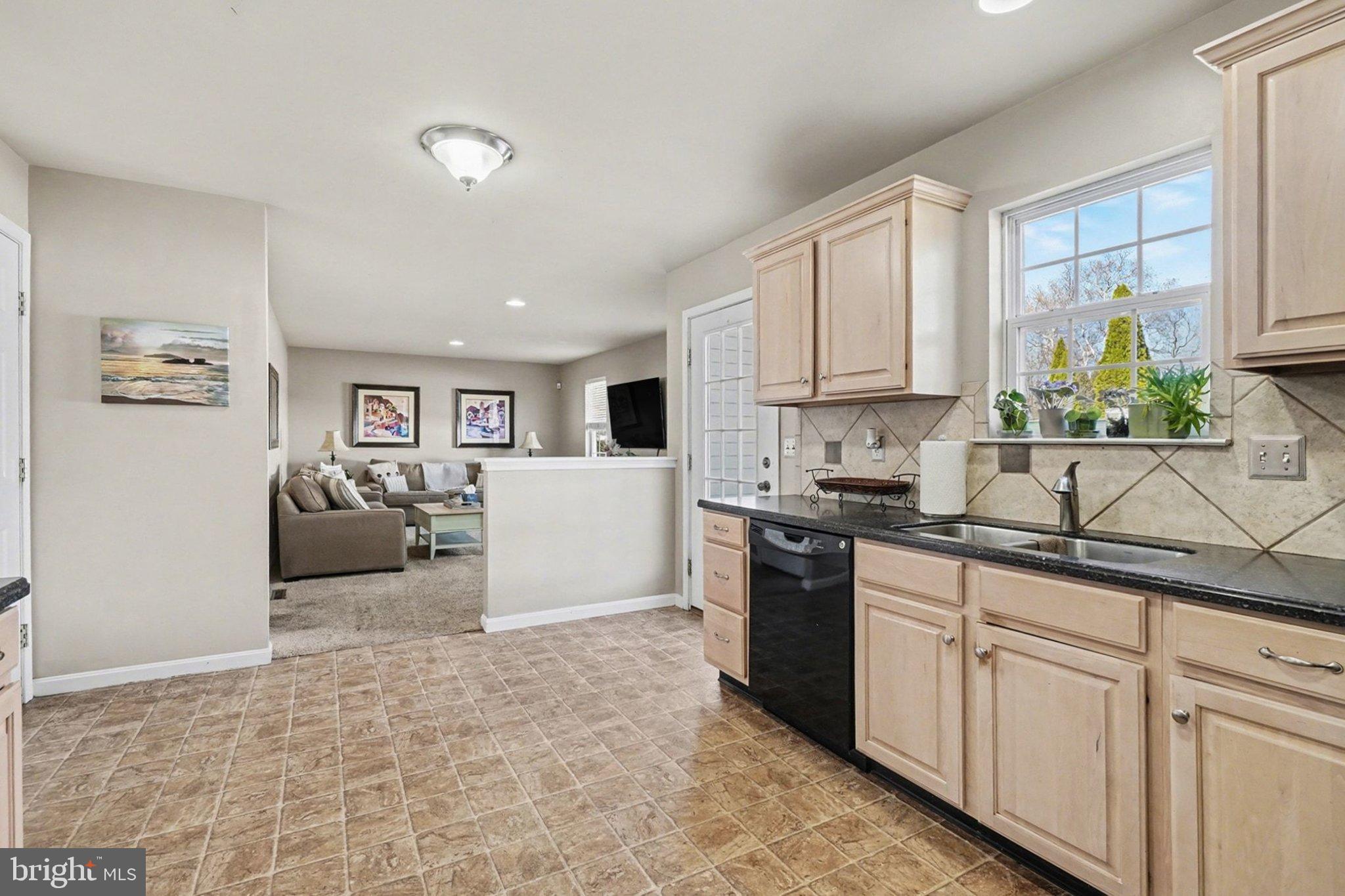 44 Oak Avenue Halifax, PA 17032 - Photo 11 of 33 a kitchen with cabinets and window