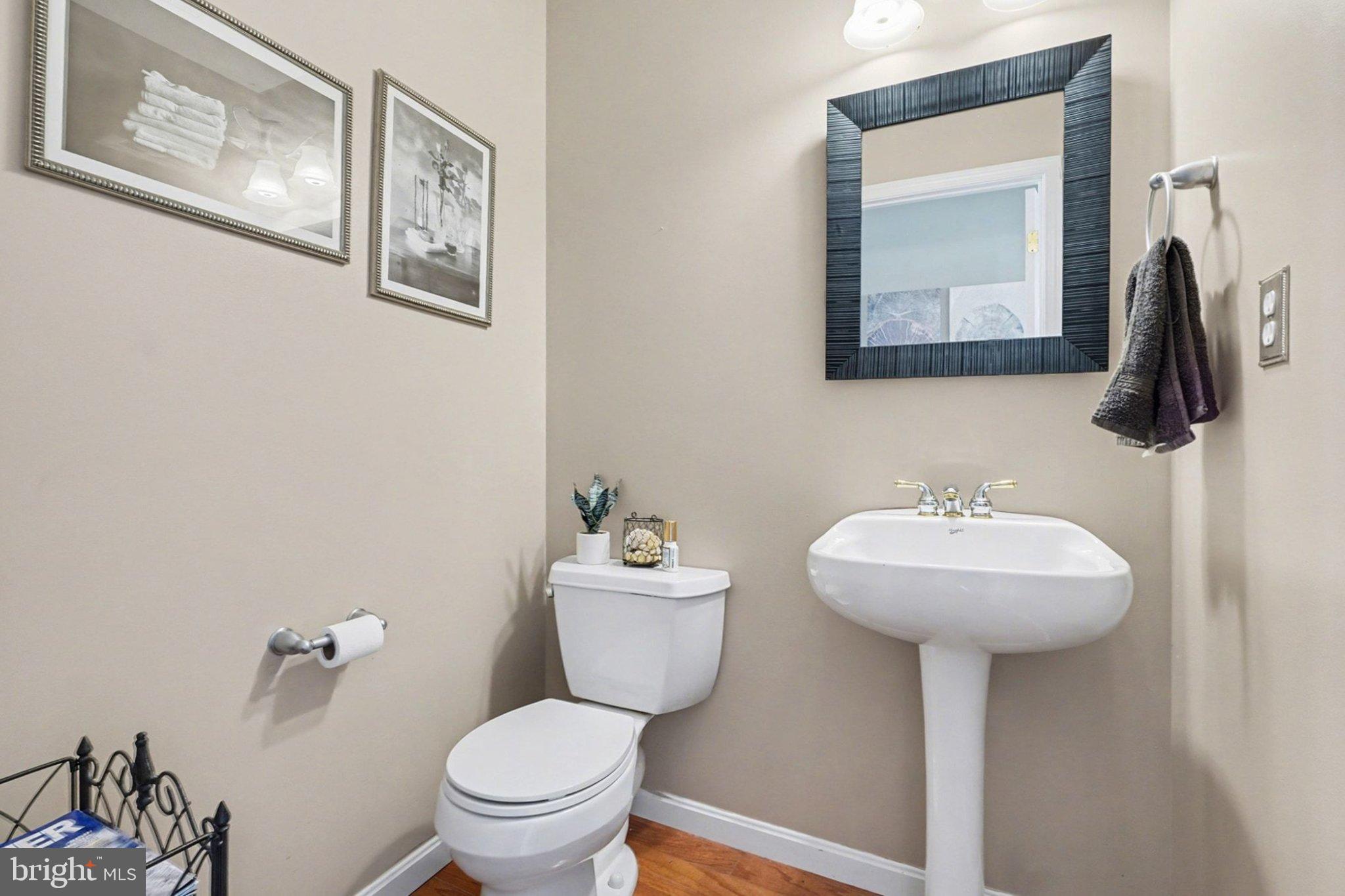 44 Oak Avenue Halifax, PA 17032 - Photo 15 of 33 a bathroom with a toilet sink and mirror