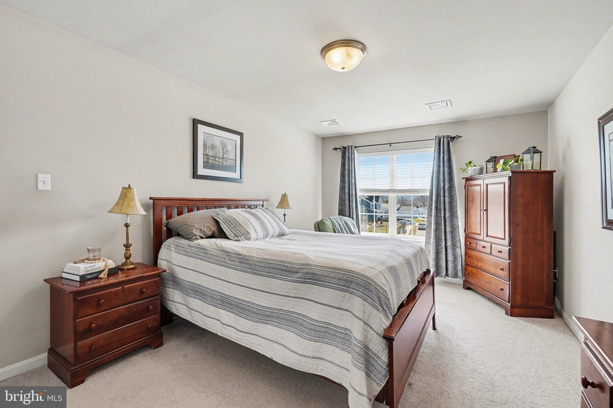44 Oak Avenue Halifax, PA 17032 - Photo 16 of 33 a bed room with a bed and a television